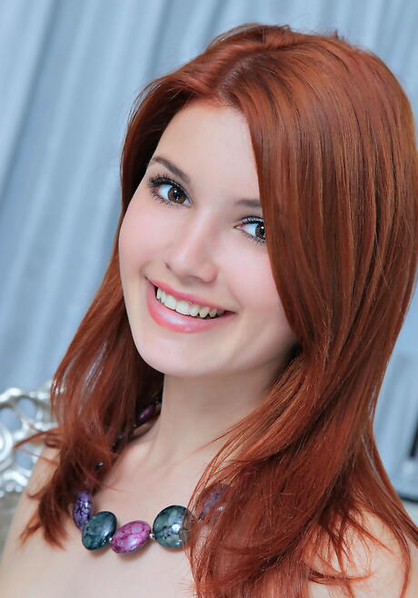 Stunning ukrainian redheaded teen Violla A bares big boobs and spreads her legs 